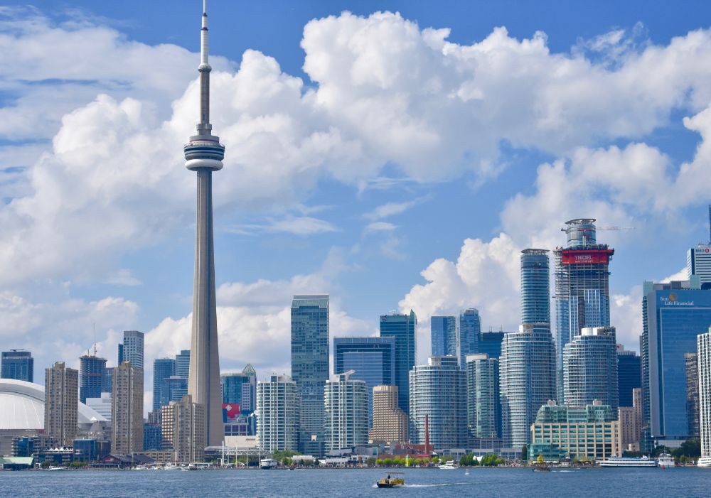 Toronto skyline featuring the CN Tower – Canada Tour Package From India