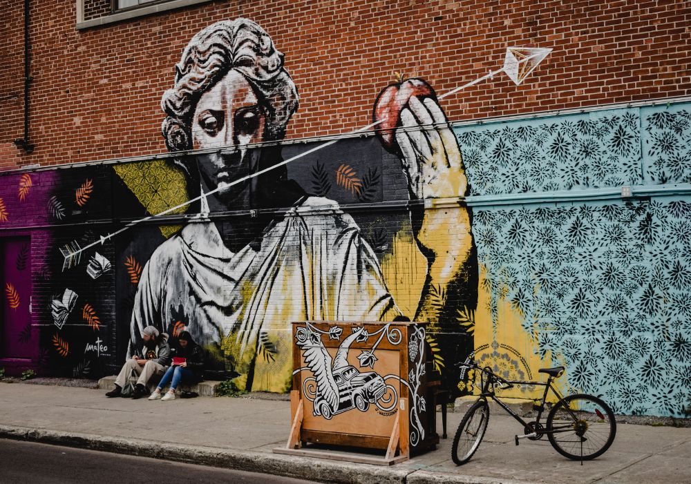 Colorful street art mural in Montreal – Canada Tour Package From India