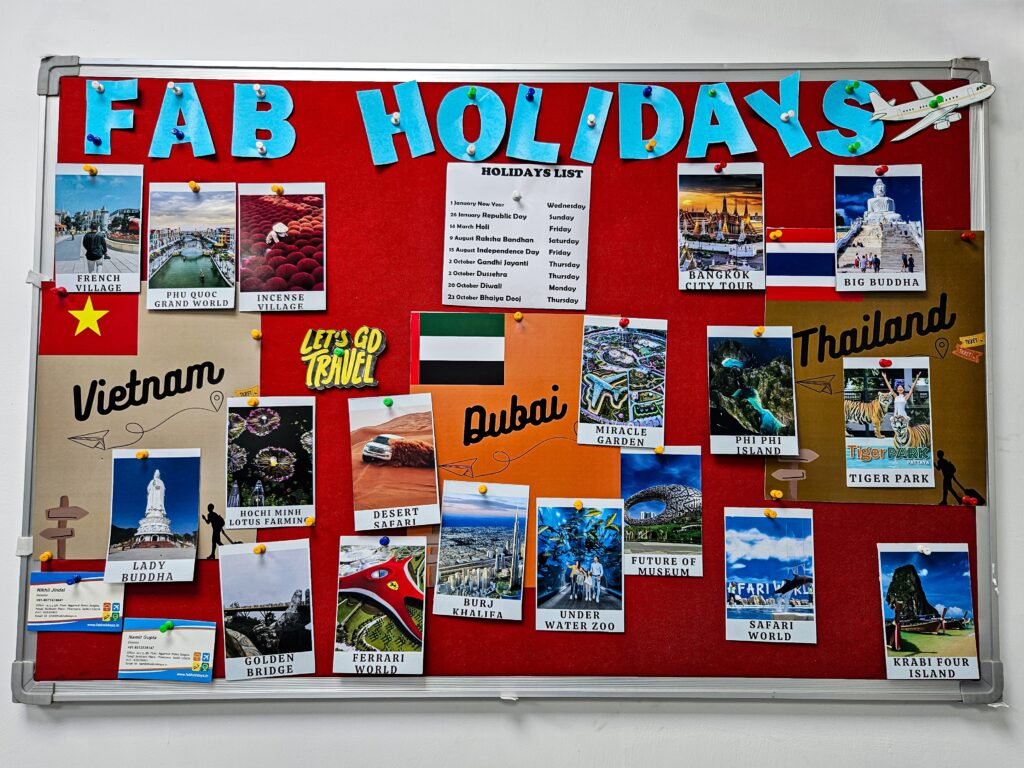 Bulletin board at Fab Holidays showcasing top tour destinations in Vietnam, Dubai, and Thailand with holiday highlights.
