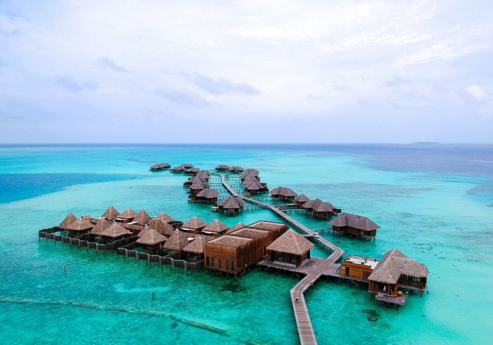 Aerial view of luxury water villas in Maldives – part of 5-Day Maldives Tour Package India