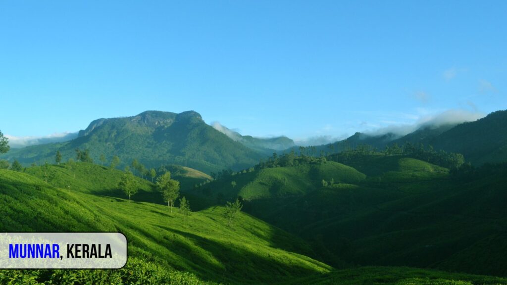 Lush green tea gardens and misty hills in Munnar, Kerala – one of the best places to visit in India during summer