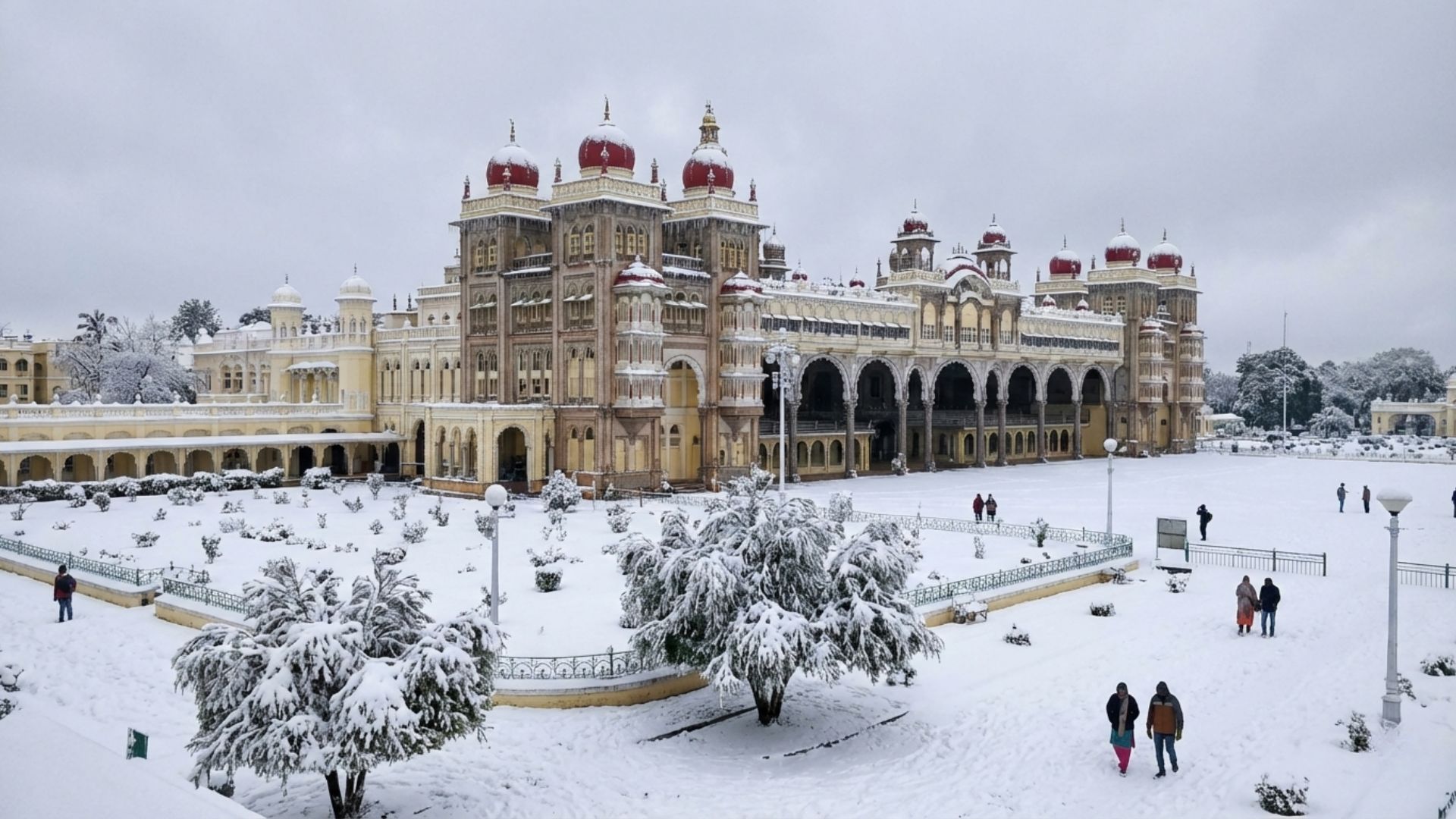 Does It Snow in South India? A winter-styled view of a historic palace in Karnataka surrounded by snow-like scenery, illustrating common myths about snowfall in South India.